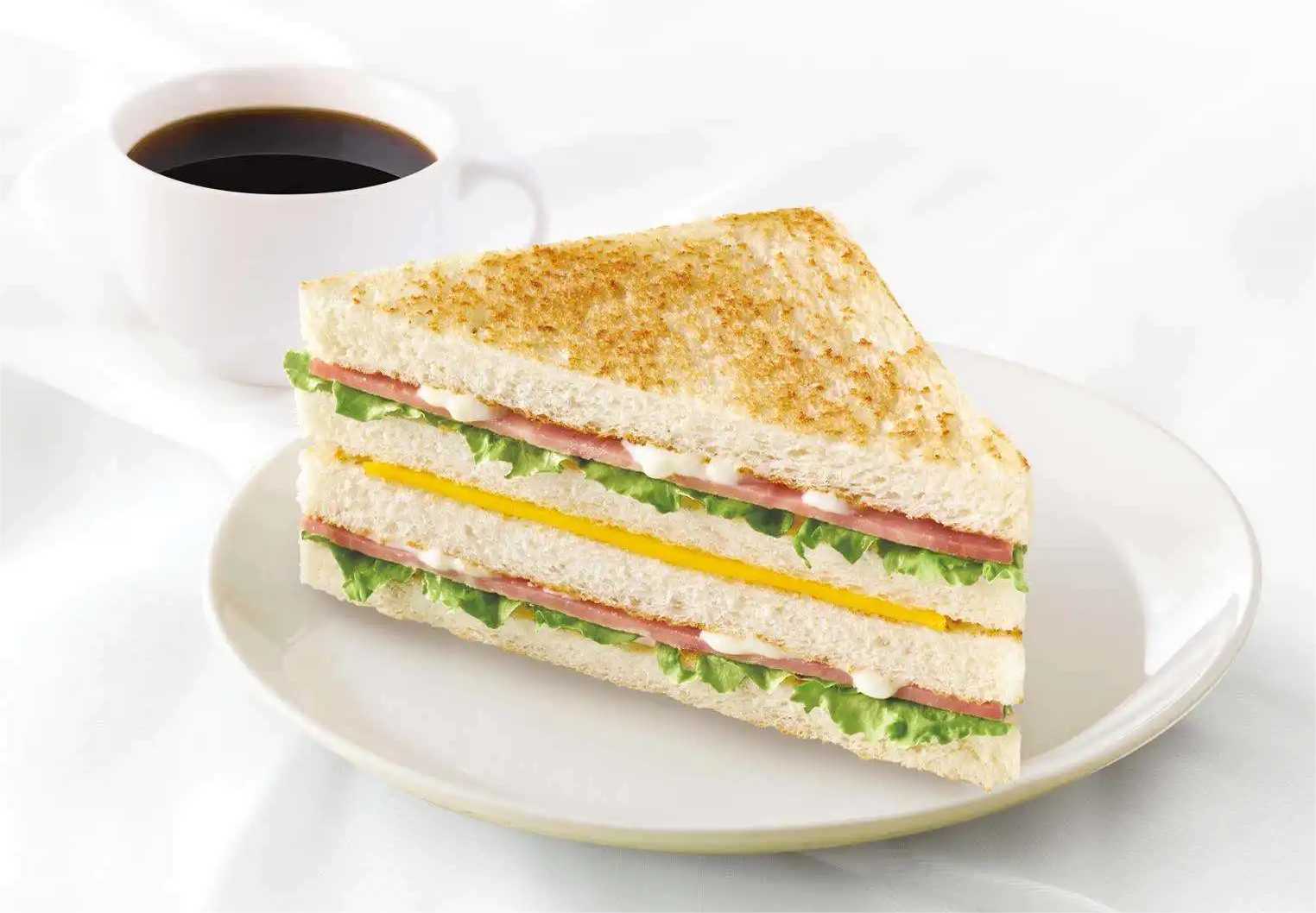 高效生產,品質保證:三明治包裝設備解析